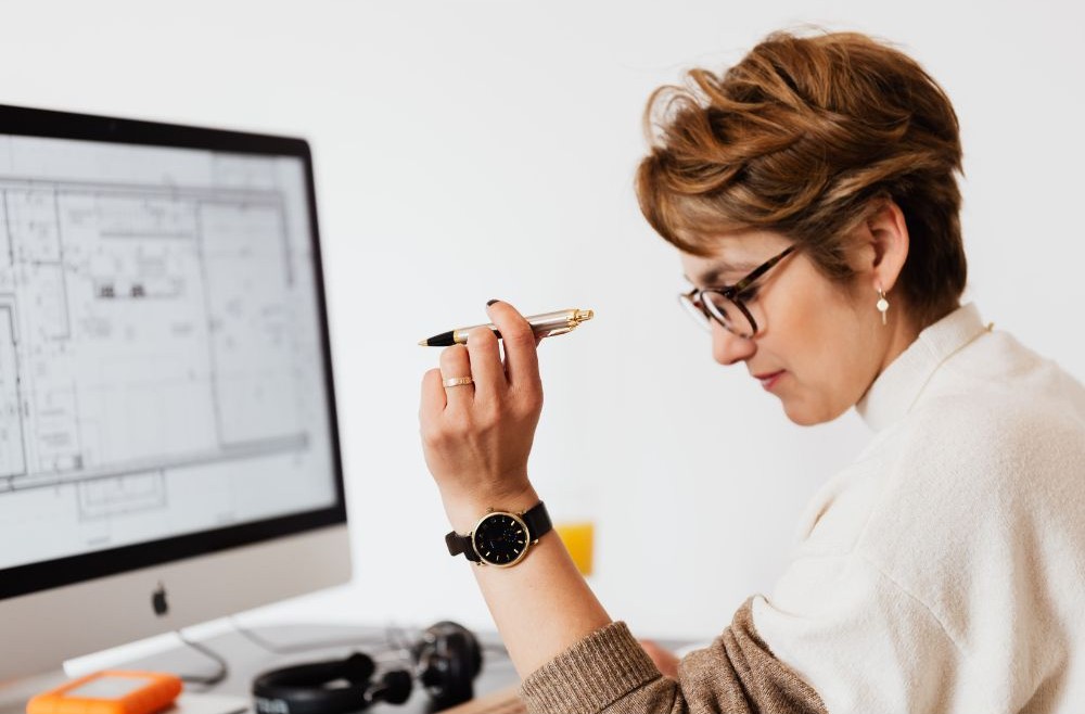 Focused woman working at her desk